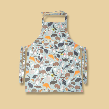 Apron with australian animal pattern on a yelllow background